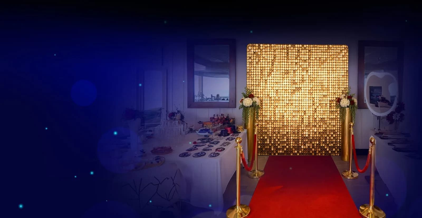 Gold shimmer wall backdrop with red carpet and stanchions