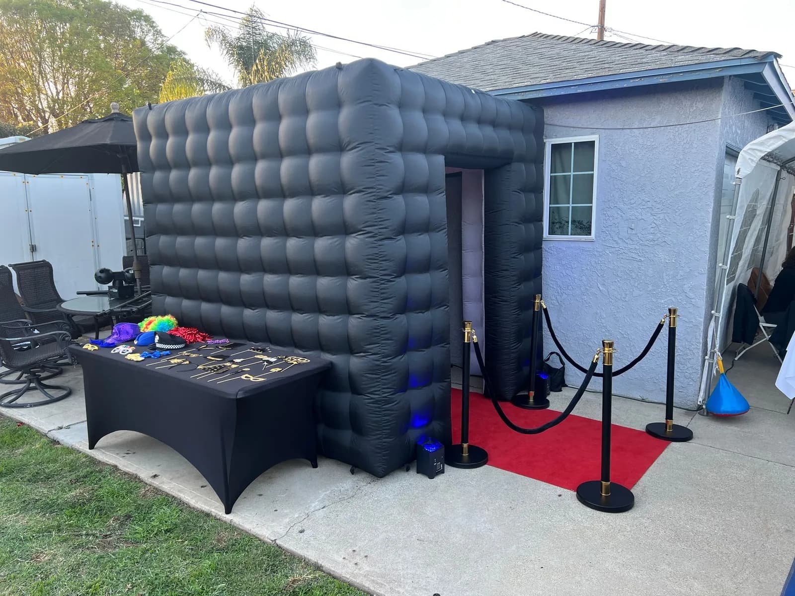 Black inflatable enclosed photo booth