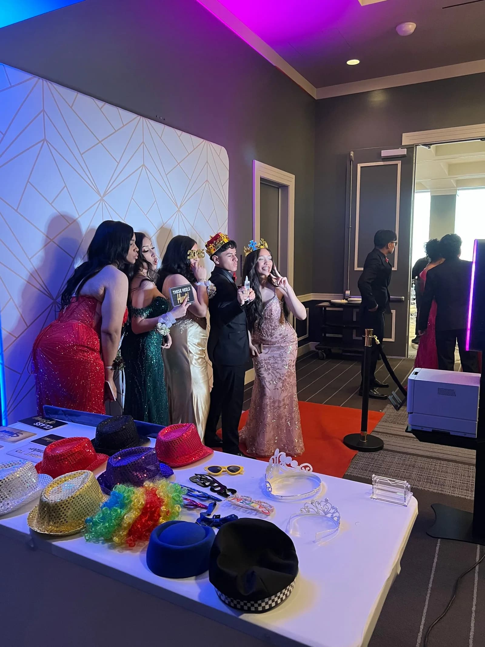 Props table beside a photo booth at an event